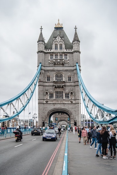 scooter rider going over Tower Bridge